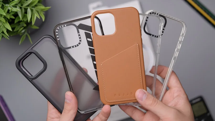 The %product_count% Best iPhone Cases 2 Person demonstrating phone case durability by dropping smartphone onto hard surface