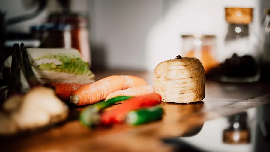 Person disposing of food scraps in kitchen sink during meal preparation