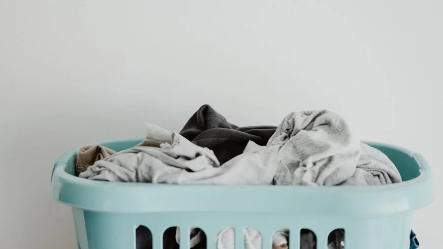 Person doing laundry with sustainable, eco-friendly cleaning products and recyclable packaging materials