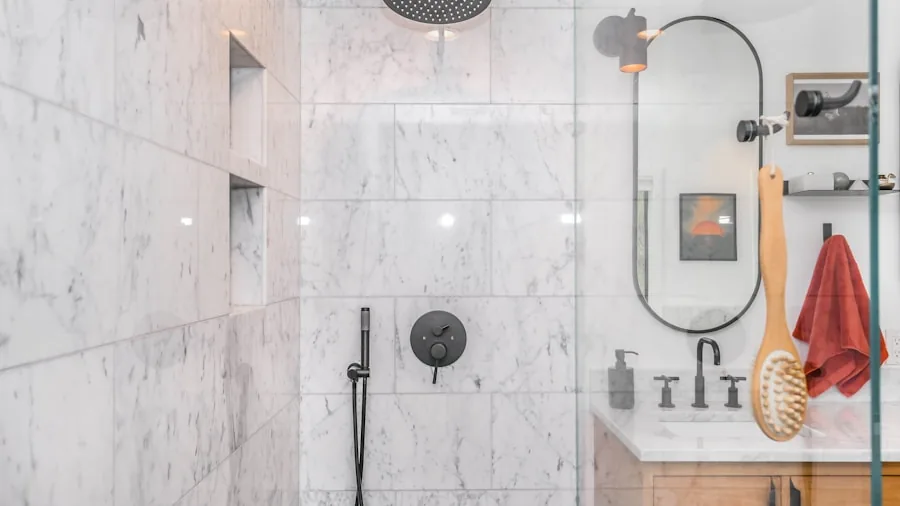 Person enjoying a relaxing shower in a modern bathroom with steam and warm lighting