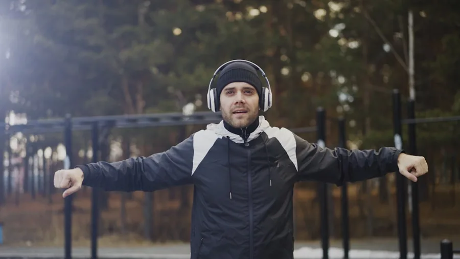 Person enjoying music outdoors with headphones, lifestyle scene