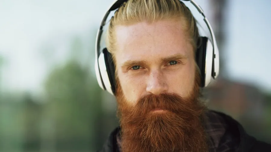 Person enjoying music outdoors with wireless earbuds during daily activities