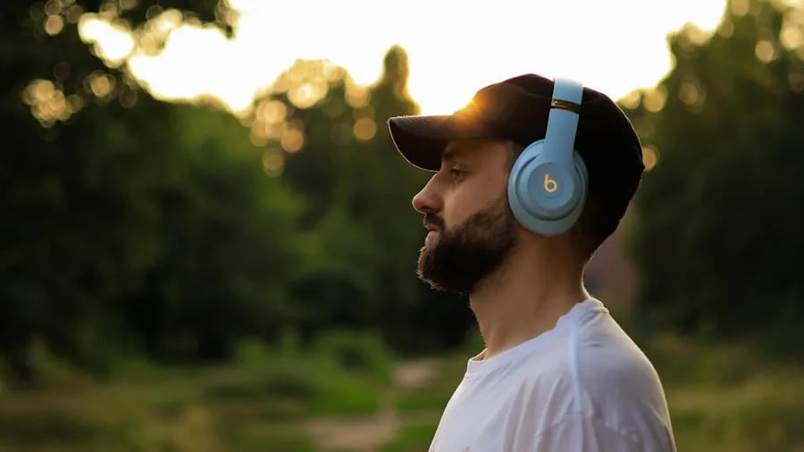 Person enjoying music with comfortable over-ear headphones during leisure time