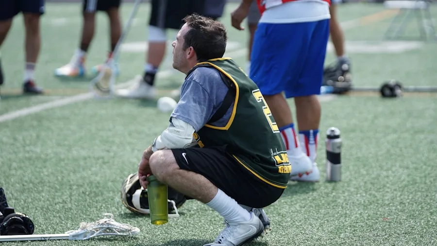 Person examining and verifying legitimate sports paddle during casual game preparation outdoors