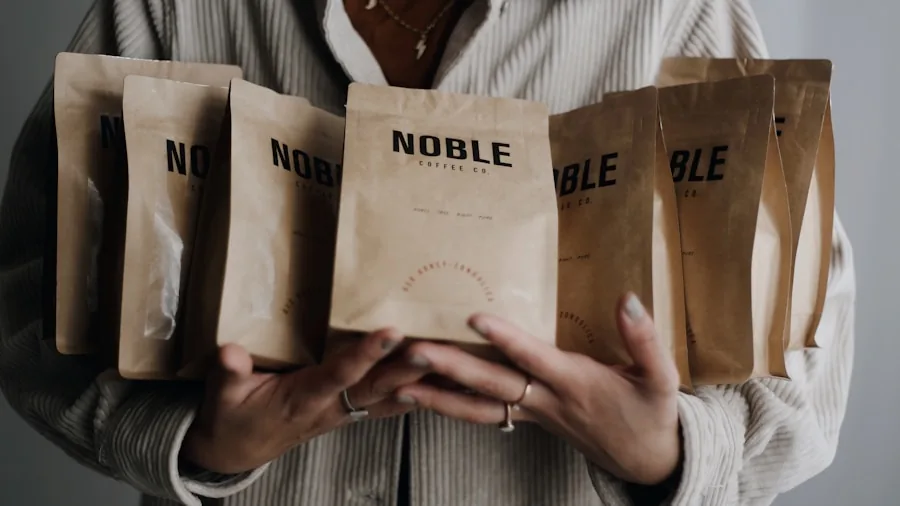 Person examining different sized coffee bags while making a purchase decision