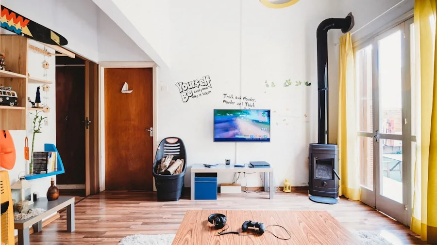 Person gaming on TV in modern living room setup with controller