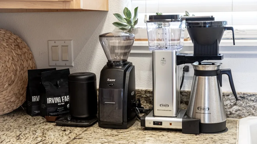 The %product_count% Best Coffee Grinders 3 Person grinding fresh coffee beans in a home kitchen with natural light
