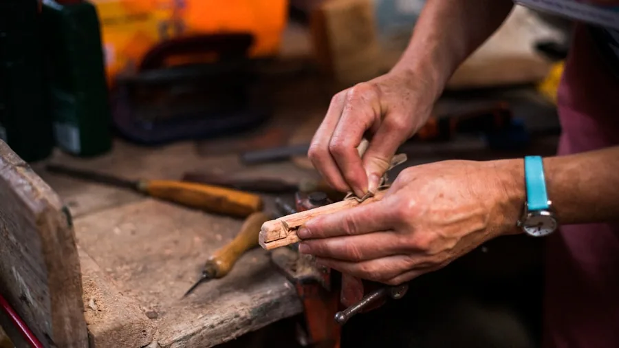 Person gripping tool with textured handle during hands-on work, demonstrating comfortable grip and control