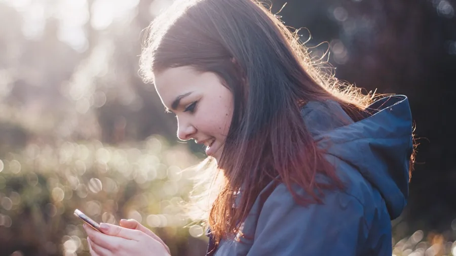 The %product_count% Best Motorola Phones 5 Person holding smartphone outdoors with 5G network connectivity, modern mobile communication lifestyle