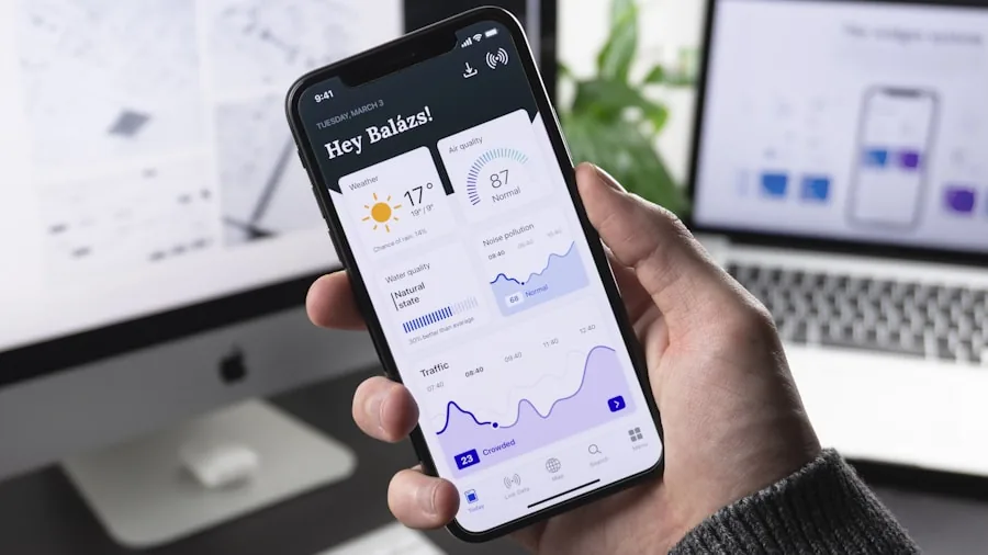 Person holding smartphone while checking software updates on screen