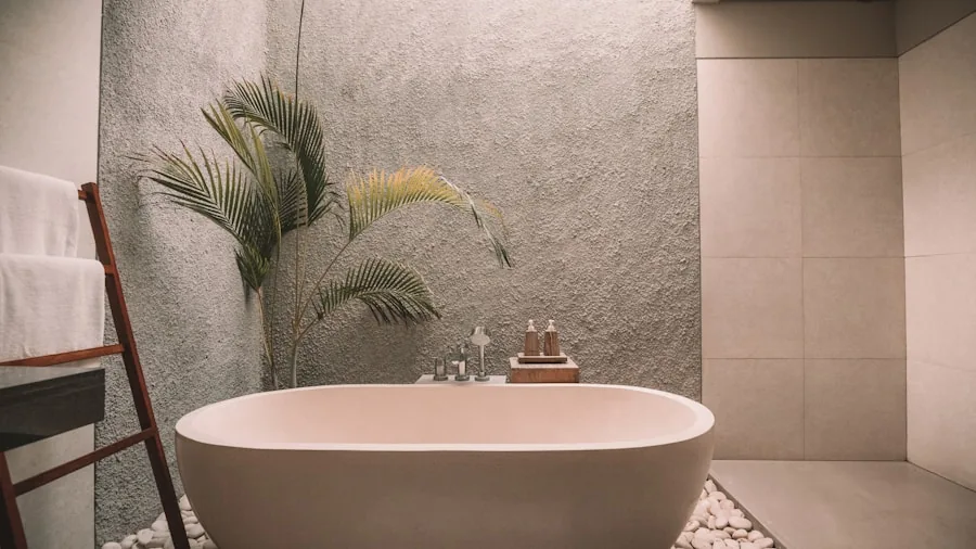 Person in contemporary bathroom preparing morning routine with natural light and clean fixtures