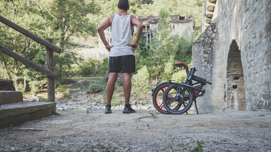 The %product_count% Best Bike Pumps 4 Person inflating bicycle tire with floor pump in outdoor setting