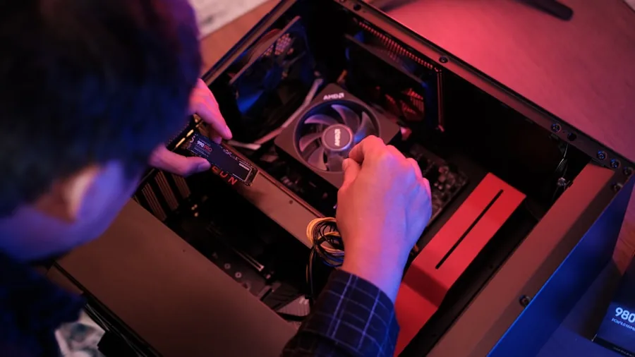 Person installing new RAM or graphics card into desktop computer tower for upgrade