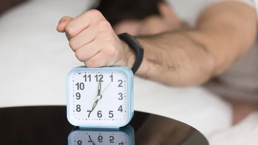 The 9 Best Alarm Clocks 3 Person jolting awake in bed startled by loud alarm clock sound in morning bedroom