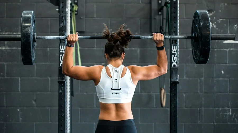 7 Tips to Build a Balanced Workout Schedule With Cross-Training 2 person lifting weights strength training focus