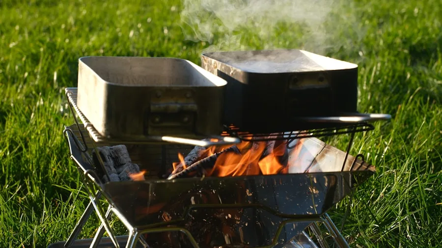 Person loading portable charcoal grill into car trunk for camping trip