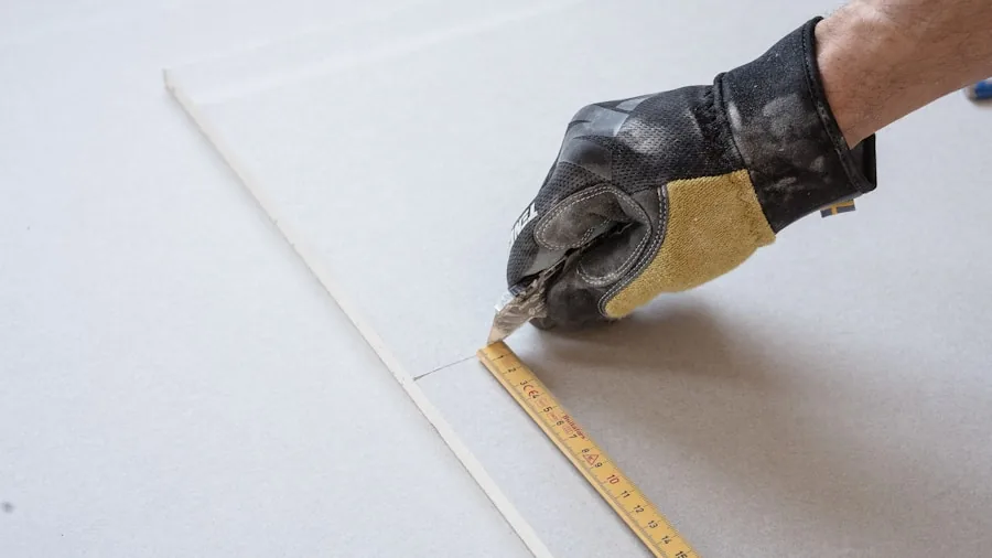 Person measuring and fitting a custom floor mat inside a vehicle footwell