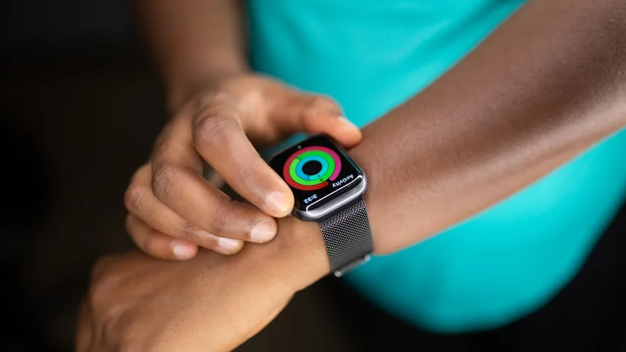 The %product_count% Best Fitness Trackers 2 Person monitoring heart rate on wrist device during intense cardio exercise session