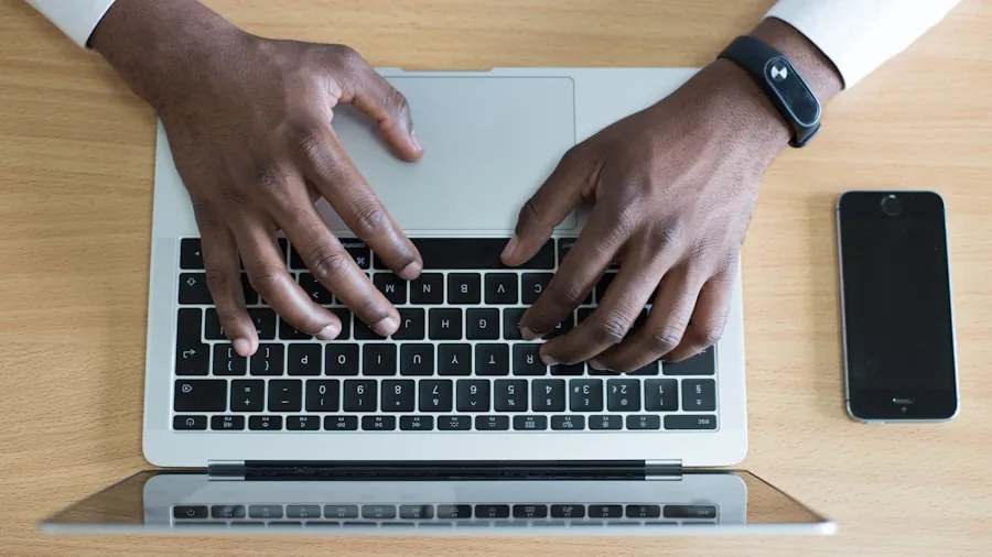 8 Essential Features to Look for in Your Next AI-Powered Laptop 3 person multitasking computer work productivity