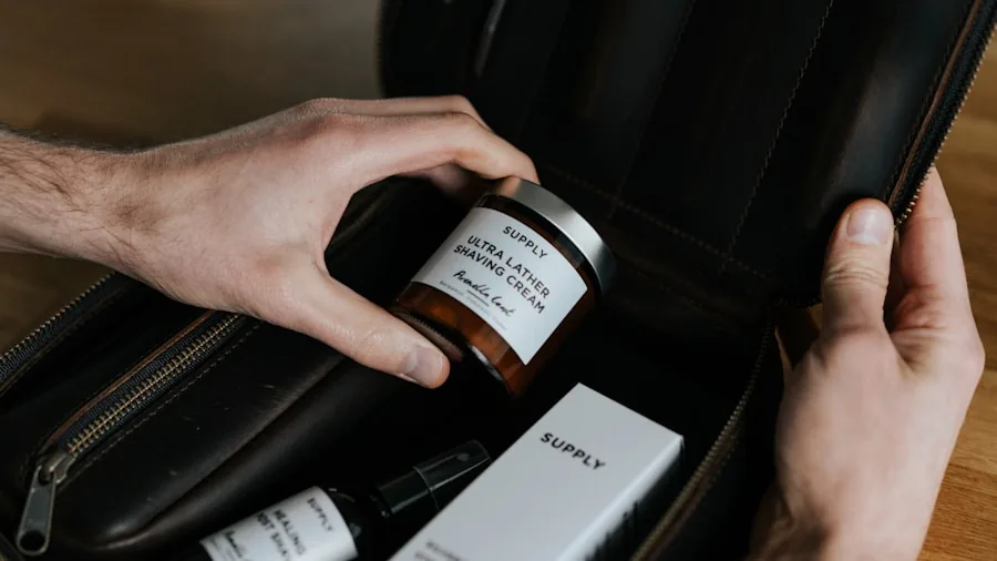 Person organizing toiletries and personal care items while packing for a trip