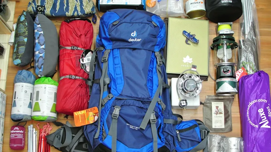 The %product_count% Best Outdoor Projectors 5 Person packing camping equipment into a backpack outdoors, preparing for a hiking trip