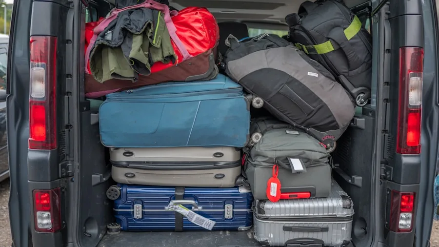 The %product_count% Best Packing Cubes 3 Person packing different sized items into organized compartments in an open suitcase for travel