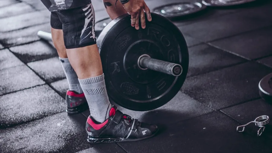 Person performing dumbbell exercise in home gym setup, demonstrating strength training with adjustable weights