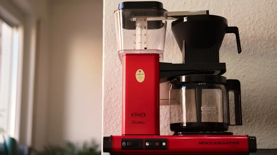 The %product_count% Best Drip Coffee Makers 5 Person preparing drip coffee in a bright kitchen during morning routine