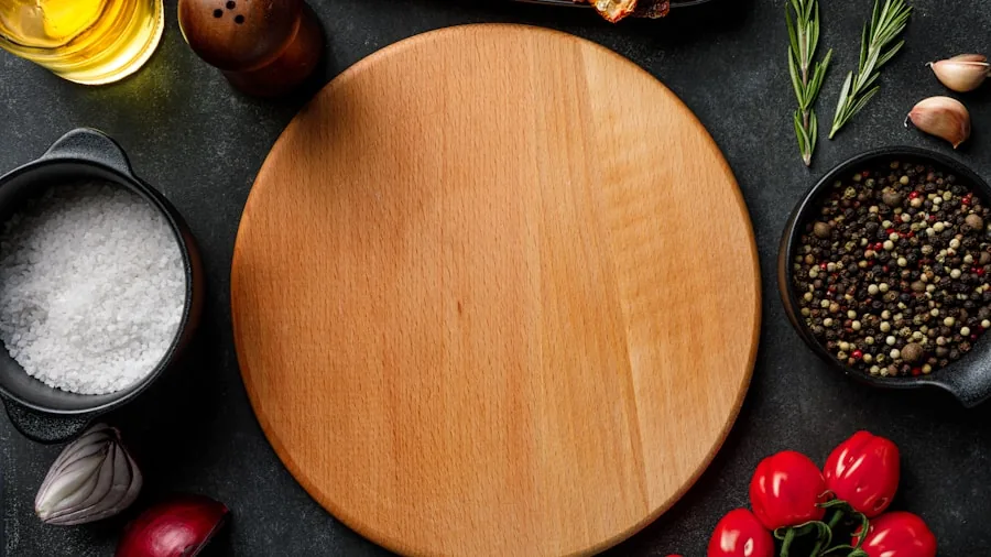 Person preparing food on wooden cutting board in bright kitchen with fresh ingredients