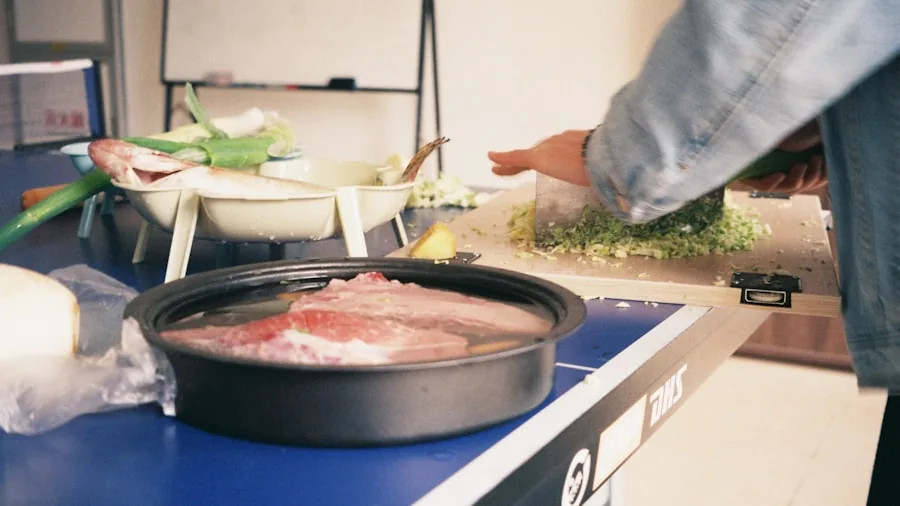 Person preparing rice in a modern kitchen with natural lighting and fresh ingredients on counter