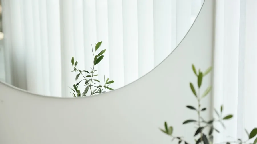 Person reading bathroom scale display in natural morning light near mirror