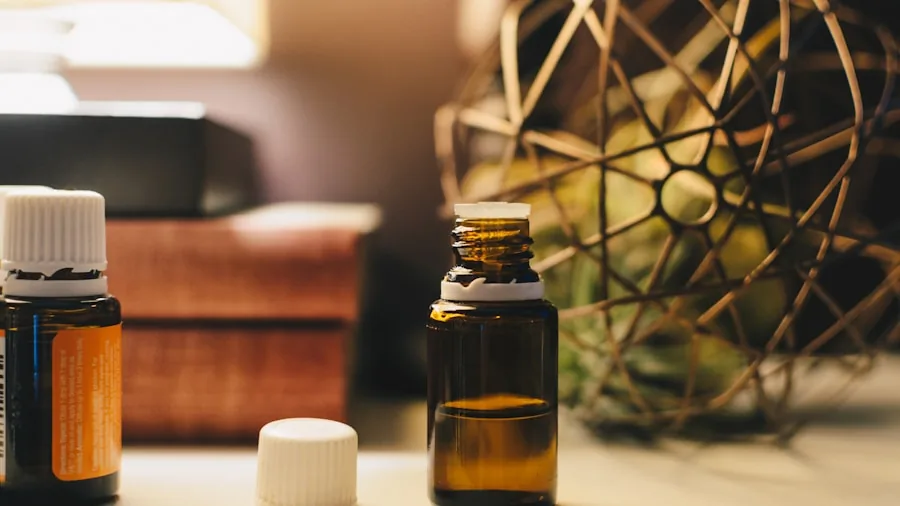 The 11 Best Humidifiers 6 Person relaxing at home with essential oil diffuser creating calming atmosphere in bedroom