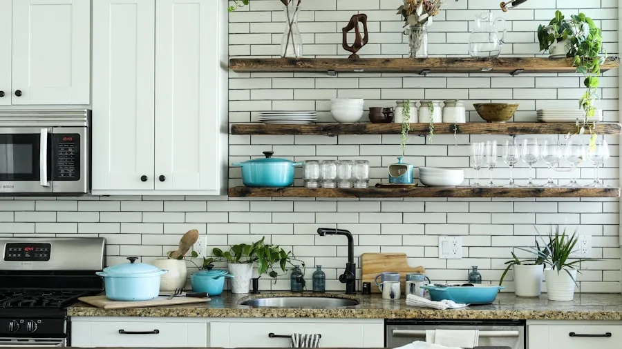 Person reviewing cookware options and budgeting for kitchen essentials on a wooden table