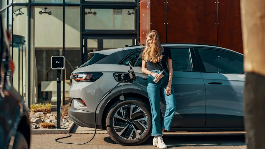 Used Electric Vehicles Are Now Outselling Gas Cars: What It Means for Your Next Purchase 2 person reviewing electric vehicle information
