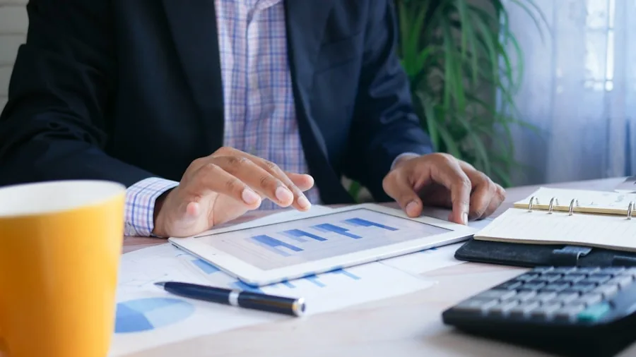 The %product_count% Best RAM 6 Person reviewing financial planning documents and making thoughtful purchasing decisions at desk