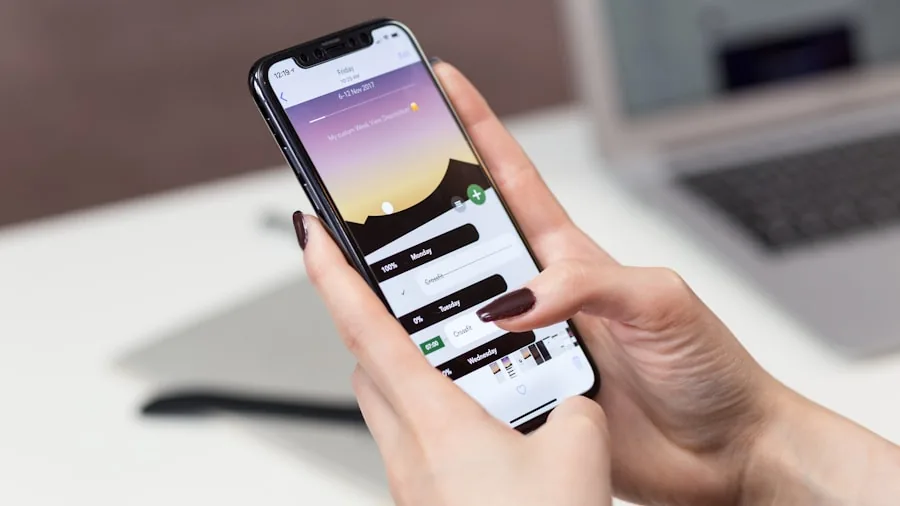 Person reviewing smartphone options while considering budget and value for gaming needs