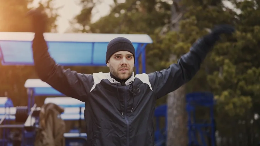 The %product_count% Best Workout Headphones 3 Person running outdoors in cold weather during winter workout session