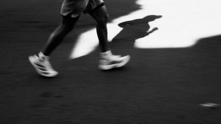 Person running outdoors on a path, demonstrating supportive athletic footwear for everyday training