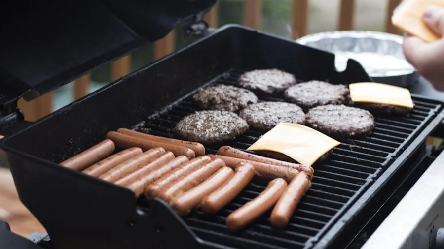 The %product_count% Best Outdoor Grills 5 Person setting up a compact portable grill at a campsite for outdoor cooking