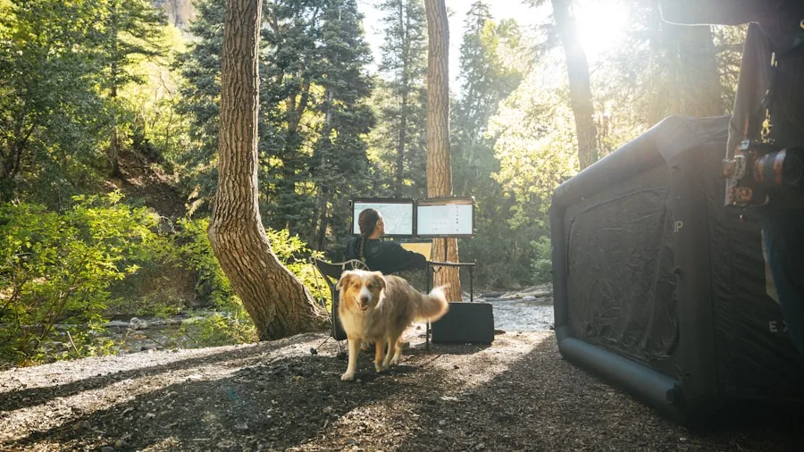 The %product_count% Best Quiet Generators 4 Person setting up compact portable generator at campsite for outdoor recreational activities