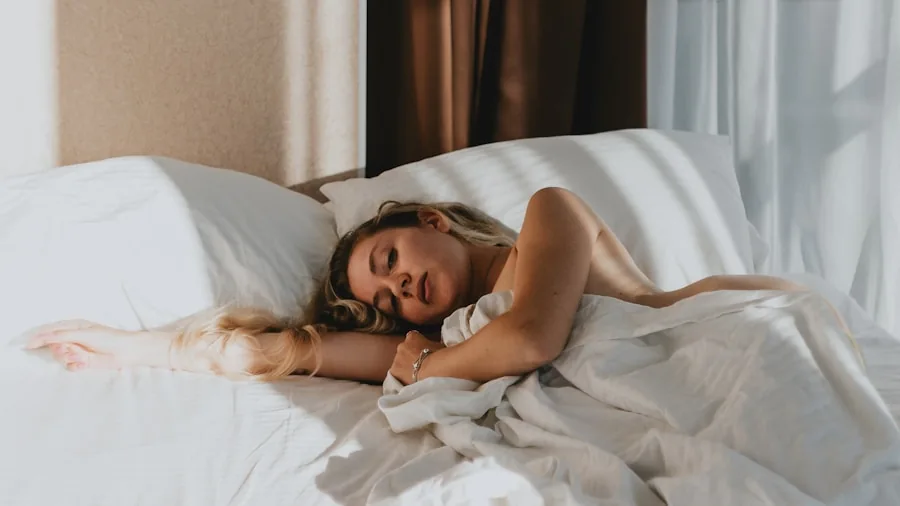 The 13 Best Mattresses 6 Person sleeping peacefully on a comfortable bed with natural morning light streaming through bedroom window