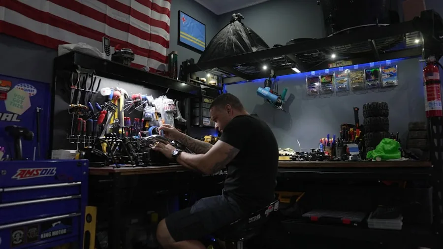 Person sorting and organizing various hand tools on a wooden workbench in natural light