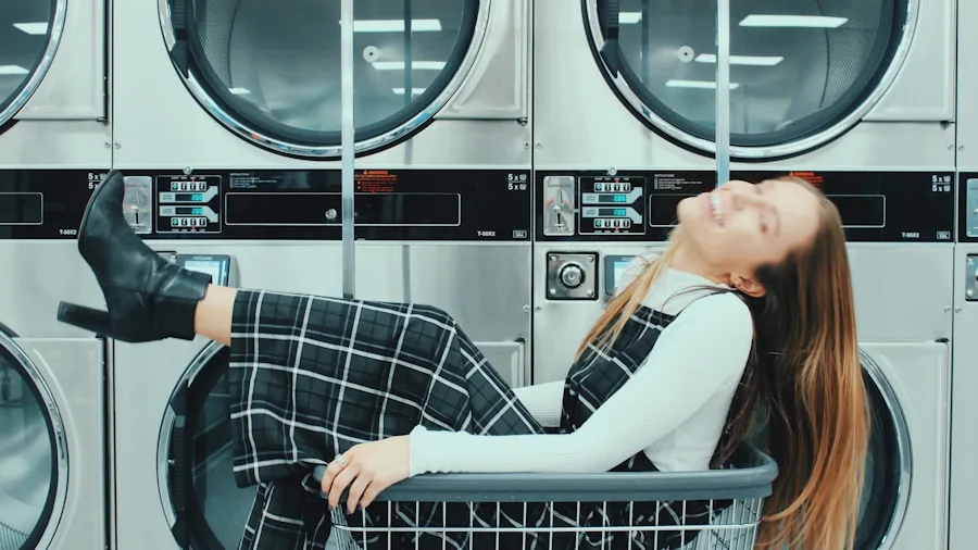 Person sorting and preparing laundry in a bright home laundry room