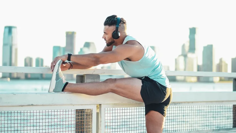 Person stretching foot and arch on court after intense athletic activity