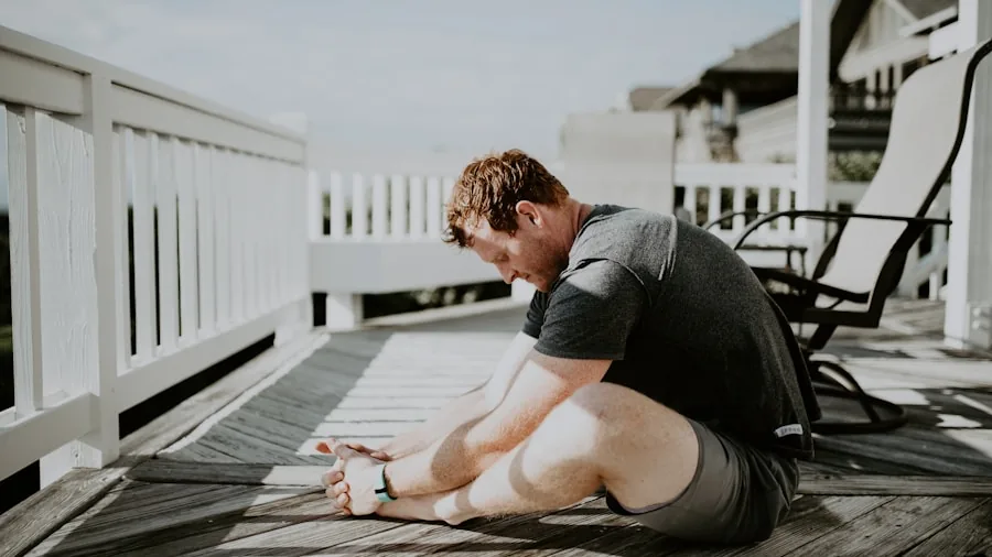 Person stretching hamstring and leg muscles after workout for recovery and mobility