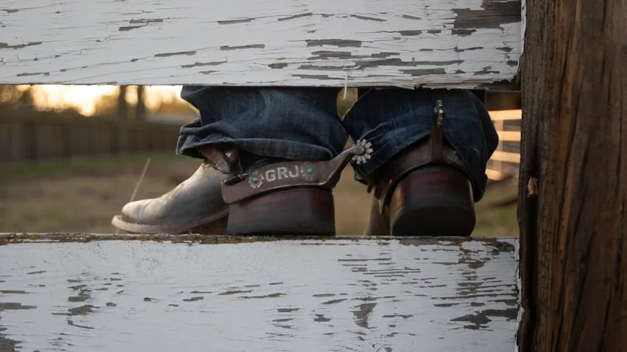 Person styling cowboy boots with denim and casual clothing in everyday lifestyle setting
