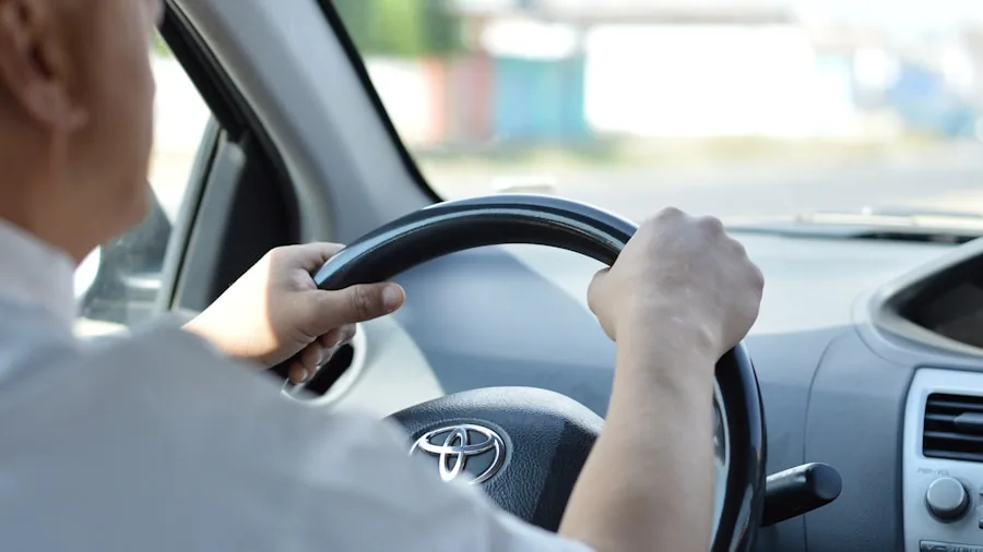 person test driving sedan