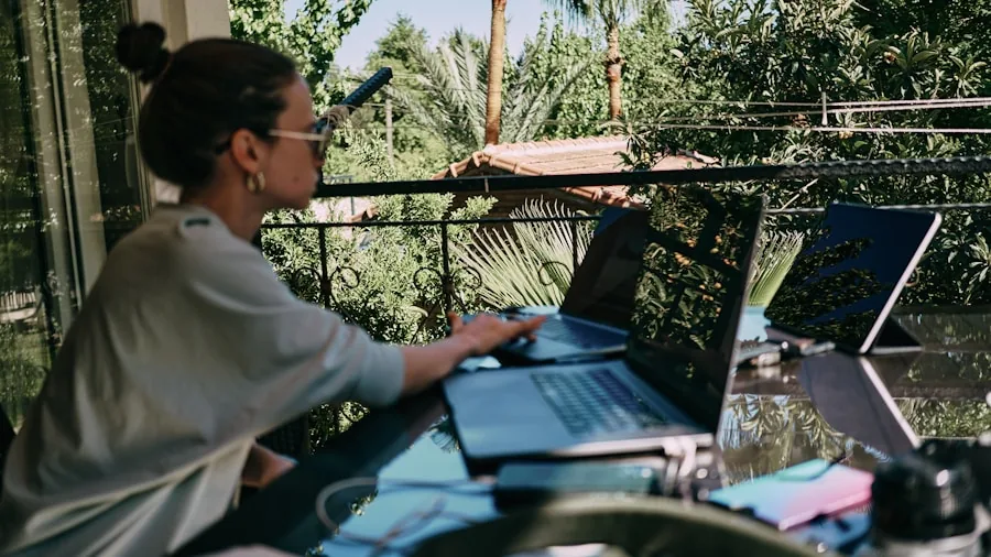 Person using laptop to manage home network security settings and wireless connections