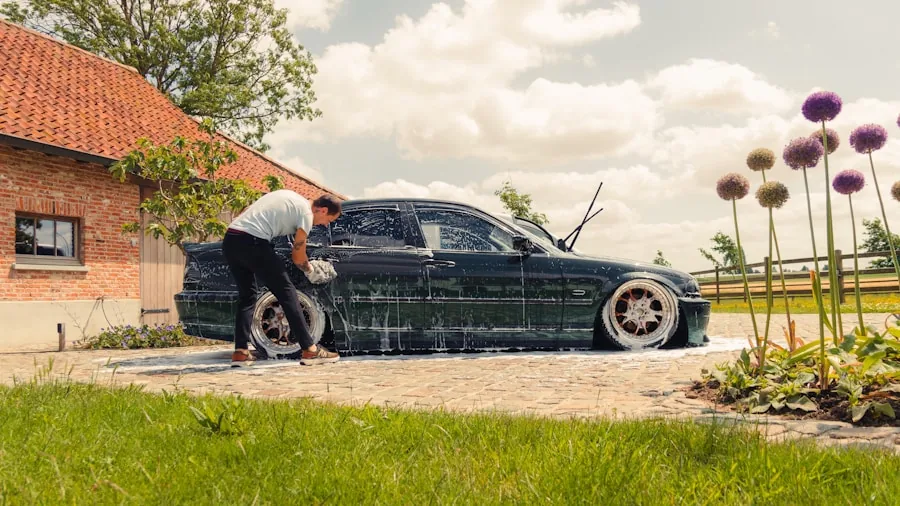 The %product_count% Best Tire Cleaners 6 Person washing vehicle tires with cleaning solution in a driveway during regular car maintenance