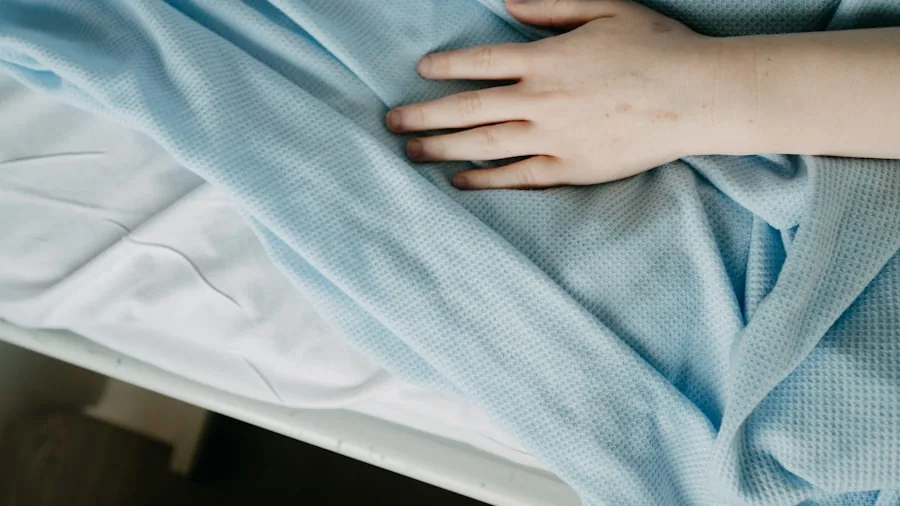 Person washing white pillowcase and bedding in washing machine for household cleaning and hygiene maintenance